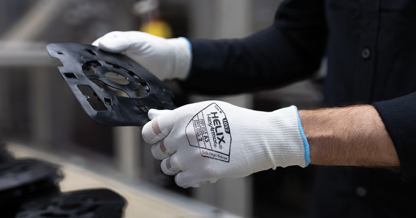 Hands wearing the Helix 1052 with an up-close view of the perforated breakaway fingers.