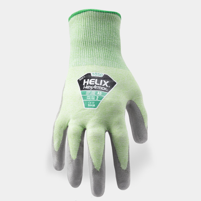 Back of hand view of Helix 1050 hi vis work gloves, showcasing the glove label and HPPE/nylon blend shell.