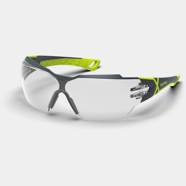 Grey and yellow MX300 anti-fog safety glasses shown as they are sitting on a table.