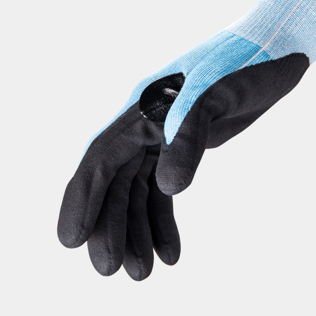 Side view of Helix 3020 puncture-resistant gloves, showcasing the seamless knit and reinforced thumb saddle.