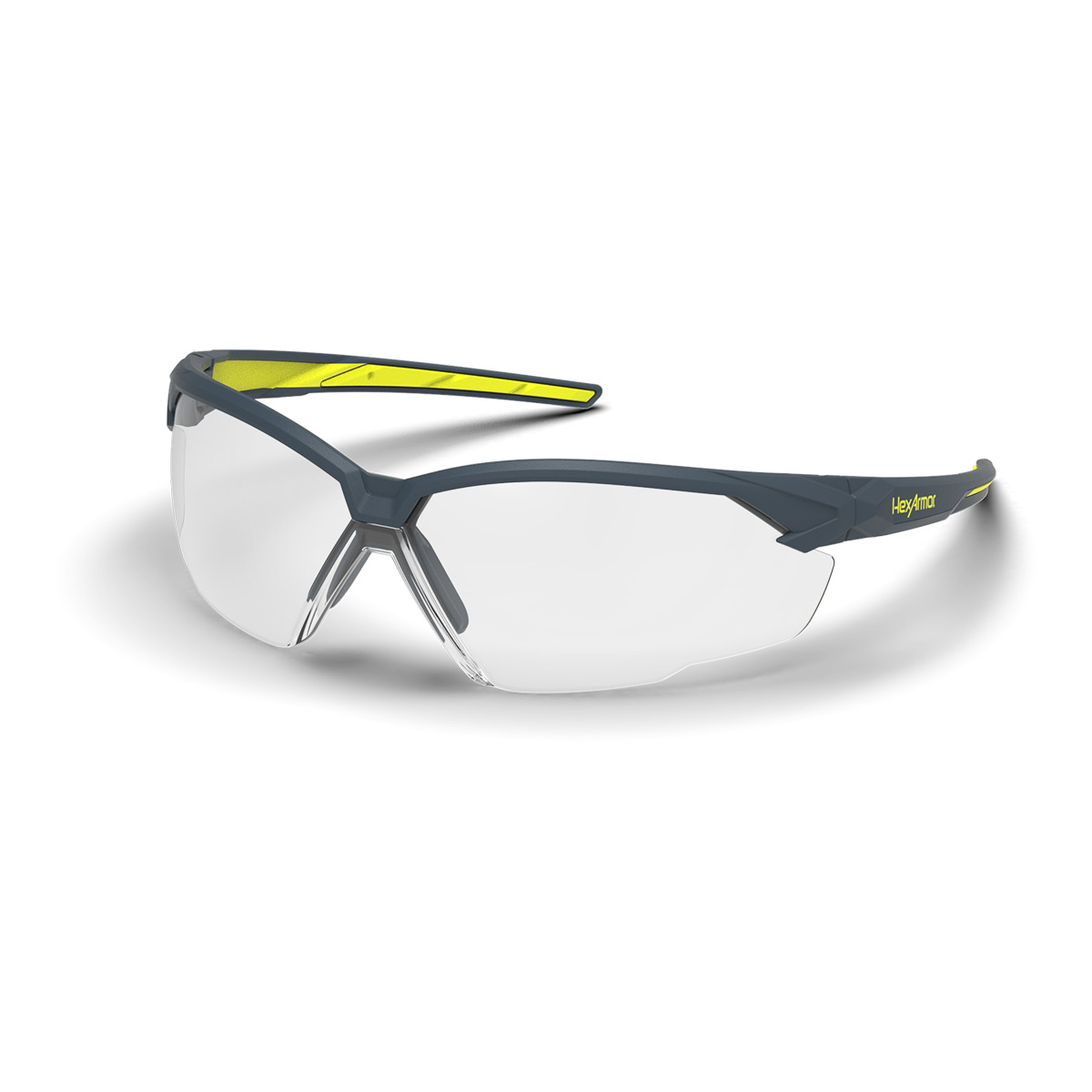 Grey and yellow NX1 anti-fog safety glasses shown as they are sitting on a table.
